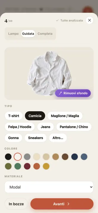 Una camicia che entra in armadio: lo sfondo viene ritagliato e i campi tipo, colore e materiale si riempiono da soli.